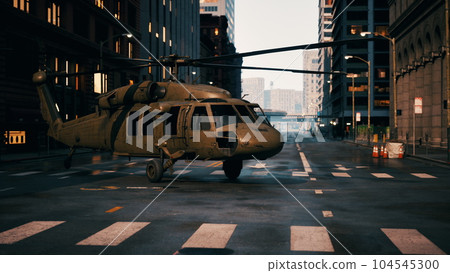 military helicopter in downtown at sunset military helicopter in downtown at sunset 104545300