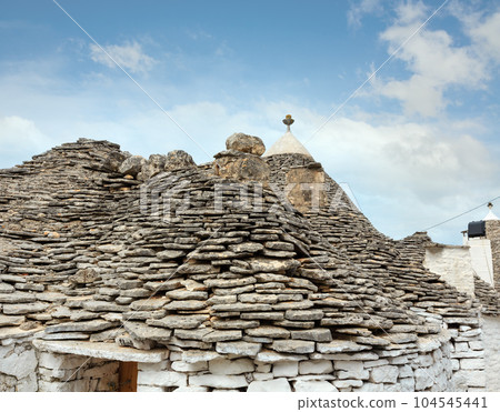 Trulli houses in Alberobello, Italy 104545441