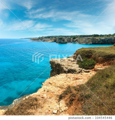 Faraglioni at Torre Sant Andrea, Italy 104545446
