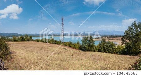 Summer Ulza Lake view from mountain road in Diber County, Balkan mountains, Albania, Europe. 104545565