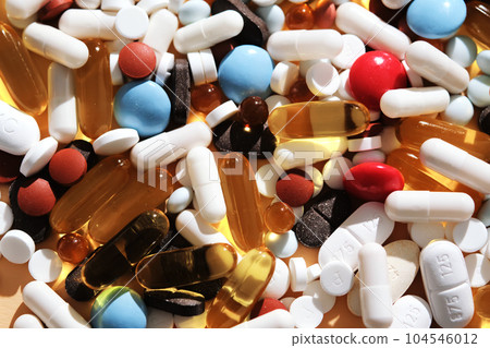 Abstract background with many pills and vitamins. Abstract background with many pills and vitamins. 104546012