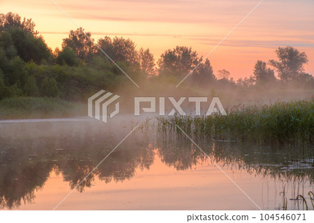 Fog over the river at sunrise. Fog over the river at sunrise. 104546071