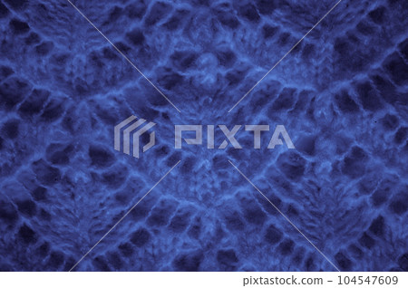Handmade knit background with detail weave threads. Handmade knit background with detail weave threads. 104547609