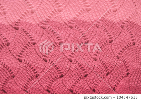 Handmade knitted background with detail woven threads. Handmade knitted background with detail woven threads. 104547613