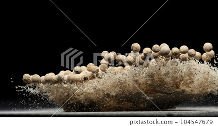 White Pepper seeds fly explosion, white Pepper mix powder float explode, abstract cloud fly. Peppercorn mix powder splash throwing in Air. Black background Isolated selective focus blur 104547679
