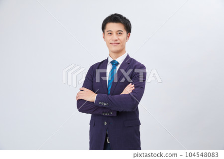 Young businessman in a jacket Young businessman in a jacket 104548083