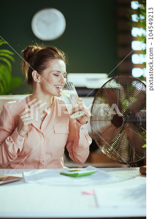 happy modern 40 years old woman employee at work 104549213