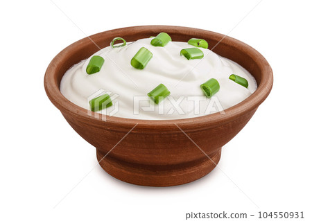sour cream or yogurt in ceramic bowl with green onion isolated on white background with full depth of field sour cream or yogurt in ceramic bowl with green onion isolated on white background with full depth of field 104550931
