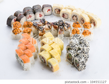 Japanese food restaurant, sushi maki gunkan roll plate or platter set. Sushi set and composition Japanese food restaurant, sushi maki gunkan roll plate or platter set. Sushi set and composition 104551127