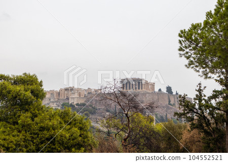 Acropolis hill, cloudy Athens landmark, Greece Acropolis hill, cloudy Athens landmark, Greece 104552521