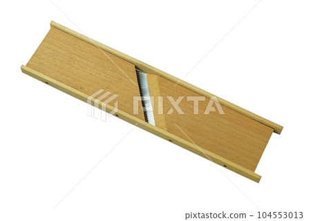 Wooden vegetable grater isolated on a white background. Rustic kitchenware. Wooden vegetable grater isolated on a white background. Rustic kitchenware. 104553013