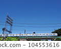 The Seibu Tamagawa Line running under the blue sky 104553616