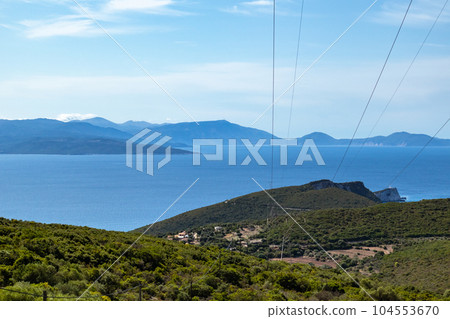 Electrical line on green Lefkada island in Greece Electrical line on green Lefkada island in Greece 104553670