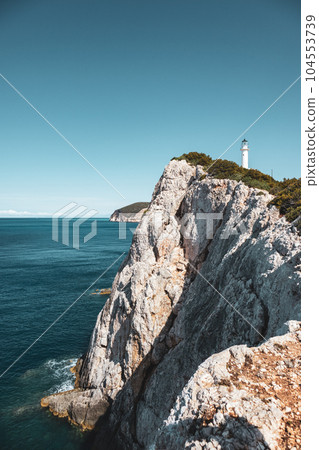 Lefkada island sea coast lighthouse on rocky cliff Lefkada island sea coast lighthouse on rocky cliff 104553739