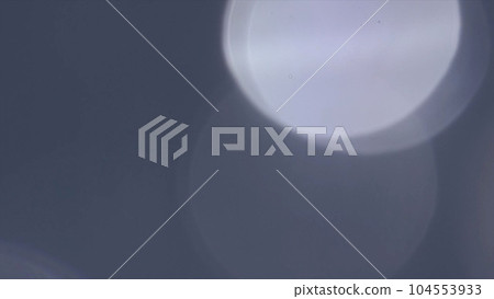 A round light like a marble on a navy background A round light like a marble on a navy background 104553933