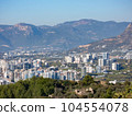 The ruins of ancient Byzantine city with new residential buildings nearby 104554078