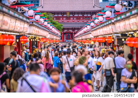 Tokyo cityscape in Japan July. Sensoji Temple is crowded. Almost no mask, but no huge infection explosion = 1 day 104554197