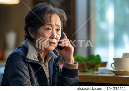 An elderly woman who makes a phone call (AI generated) 104554521