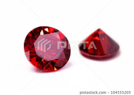 Red Ruby gemstone Round Cut isolate on white background, close up shot 104555205
