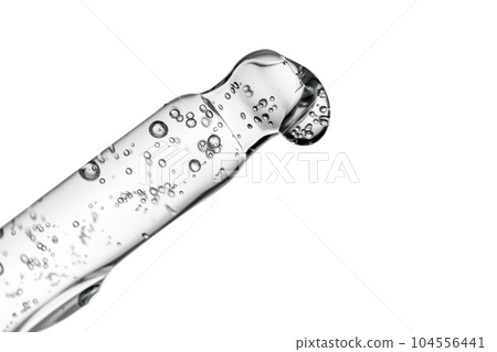 Transparent pipette with cosmetics on a white isolated background. 104556441