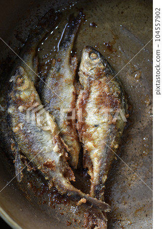 Fried river fish. Fish delicacy. Delicious fish. Fried roach. 104557902