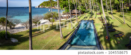 Aerial view of Haad Tien Beach and resort in Shark Bay, koh Tao, Thailand Aerial view of Haad Tien Beach and resort in Shark Bay, koh Tao, Thailand 104558675