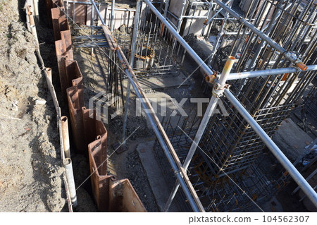 Building foundation construction site under construction Building foundation construction site under construction 104562307