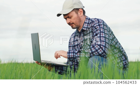 male farmer working digital laptop wheat field, agriculture, summer season village, digital technology, farming, rural local senior farmer, agriculturist worker man engineer, harvest season, wheat rye male farmer working digital laptop wheat field, agriculture, summer season village, digital technology, farming, rural local senior farmer, agriculturist worker man engineer, harvest season, wheat rye 104562433