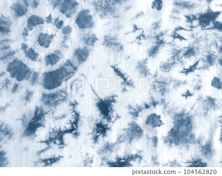 Tie dye shibori pattern. Abstract tie-dye technique hand dyed fabric. Tie dye shibori pattern. Abstract tie-dye technique hand dyed fabric. 104562820