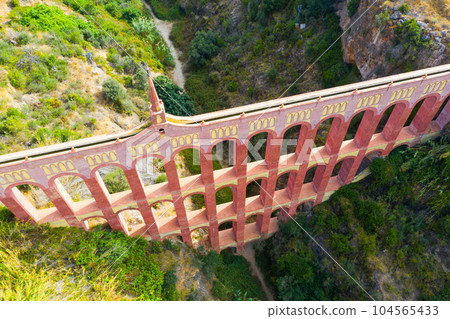 Eagle Aqueduct (Puente del Aguila) in Spanish city of Nerja Eagle Aqueduct (Puente del Aguila) in Spanish city of Nerja 104565433