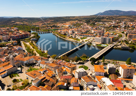 Aerial view of Mirandela with fountain and bridges crossing Tua river, Portugal 104565493