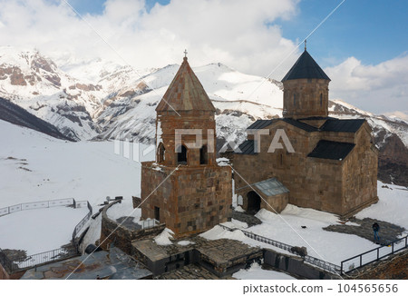 Georgian Orthodox Trinity Church at foot of Kazbek near Gergeti village 104565656