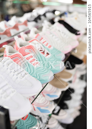 In shoe department stand womens trainers of latest summer collection In shoe department stand womens trainers of latest summer collection 104565915