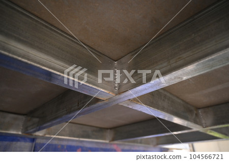 roof built from gray metal steel, construction industry 104566721