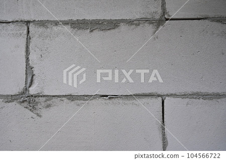 brick wall textured background, construction industry 104566722