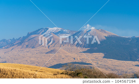 Panoramic view of Mt. Aso (snow scene) against the background of the winter sky Panoramic view of Mt. Aso (snow scene) against the background of the winter sky 104567194