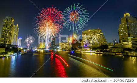 Fireworks to celebrate New Year on the Chao Phraya River in Bangkok Fireworks to celebrate New Year on the Chao Phraya River in Bangkok 104567220