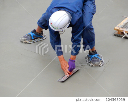 Leveling the concrete slab Leveling the concrete slab 104568039