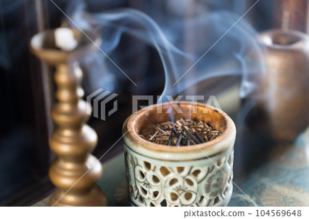 Buddhist altar incense burner 104569648