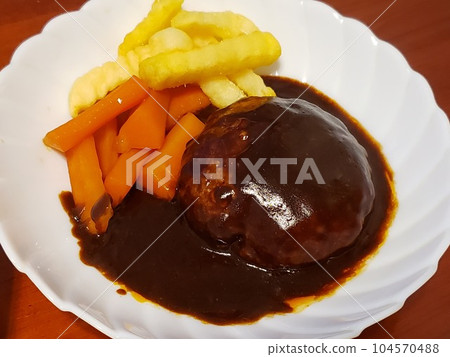 handmade hamburger on plate handmade hamburger on plate 104570488