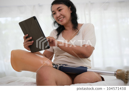 Happy Asian family spending time at home together. Happy Asian family spending time at home together. 104571438