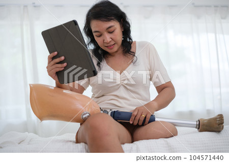 Happy Asian family spending time at home together. Happy Asian family spending time at home together. 104571440