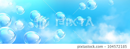 Realistic soap bubbles flying high in blue sky 104572185