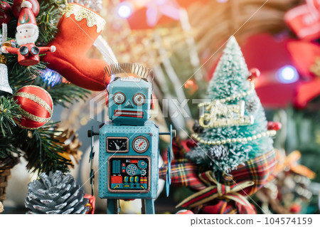 Christmas background with decorations and gift boxes on wooden Christmas background with decorations and gift boxes on wooden 104574159