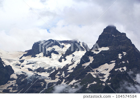 The Caucasus Mountains. Mountain peaks in summer. 104574584