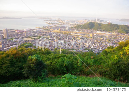 Kagawa Prefecture, looking toward the Seto Ohashi Bridge from the observatory on the summit of Mt. Aonoyama at dusk Kagawa Prefecture, looking toward the Seto Ohashi Bridge from the observatory on the summit of Mt. Aonoyama at dusk 104575475