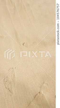 sand on the beach as background or wallpaper 104576757