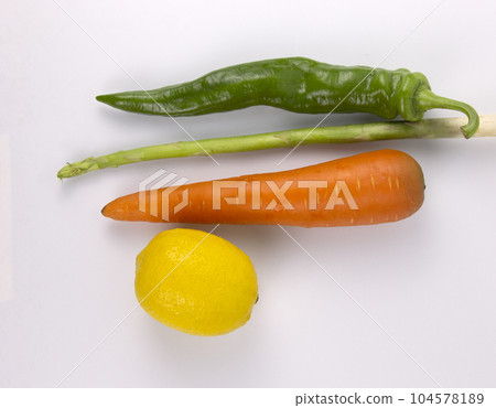 Healthy food for cooking, carrot, chili, lemon, Asparagus isolated on white background Healthy food for cooking, carrot, chili, lemon, Asparagus isolated on white background 104578189