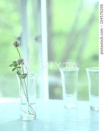 Vases and glass vases on the windowsill Vases and glass vases on the windowsill 104578208