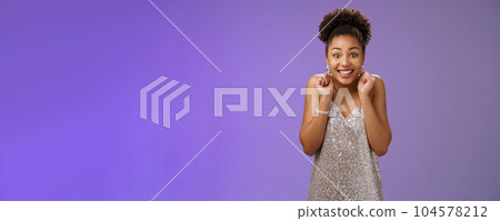 Excited good-looking happy lucky african-american woman winning money lottery casino standing amused thrilled wanna try more smiling broadly dancing clench fists rejoice triumphing Excited good-looking happy lucky african-american woman winning money lottery casino standing amused thrilled wanna try more smiling broadly dancing clench fists rejoice triumphing 104578212